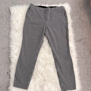 Alfanie petite black and white checkered stretchy ankle fit slacks.